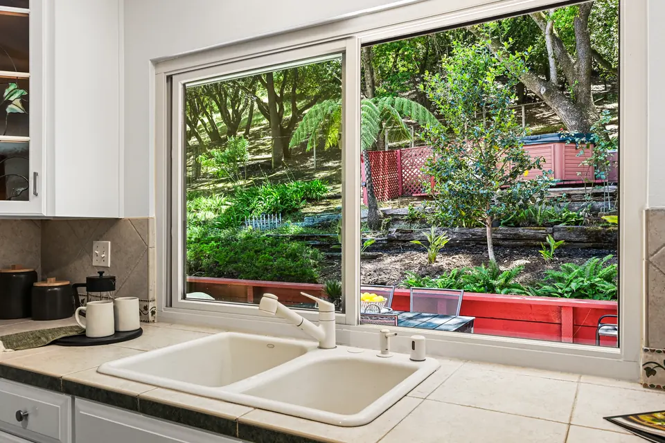 Window over the kitchen sink, looking out to the garden and deck